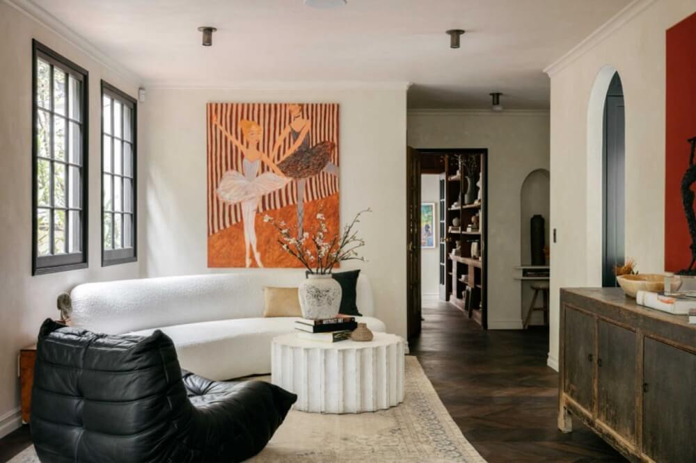 A Beautiful Tudor House in Los Feliz 14 black-white-living-room-wooden-floor-colorful-art-nordroom