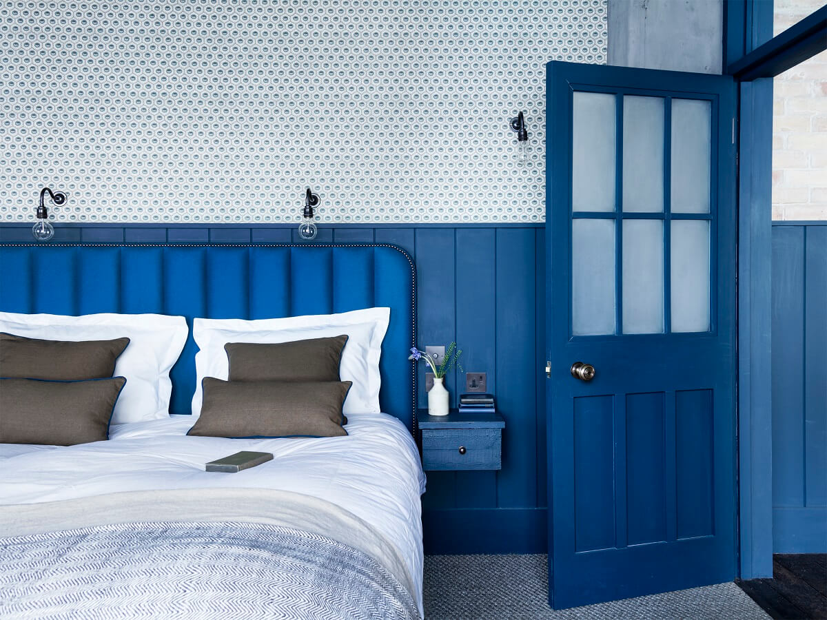 An Industrial Apartment by Mark Lewis Interior Design 11 blue-bedroom-loft-mark-lewis-nordroom