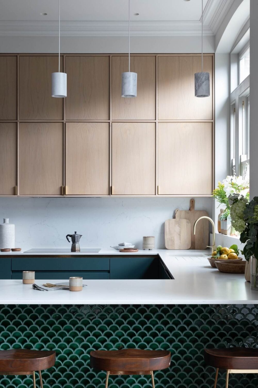 A Victorian Home in London with Bold Color Accents 11 breakfast-bar-green-tiles-modern-kitchen-blue-cabinets-nordroom