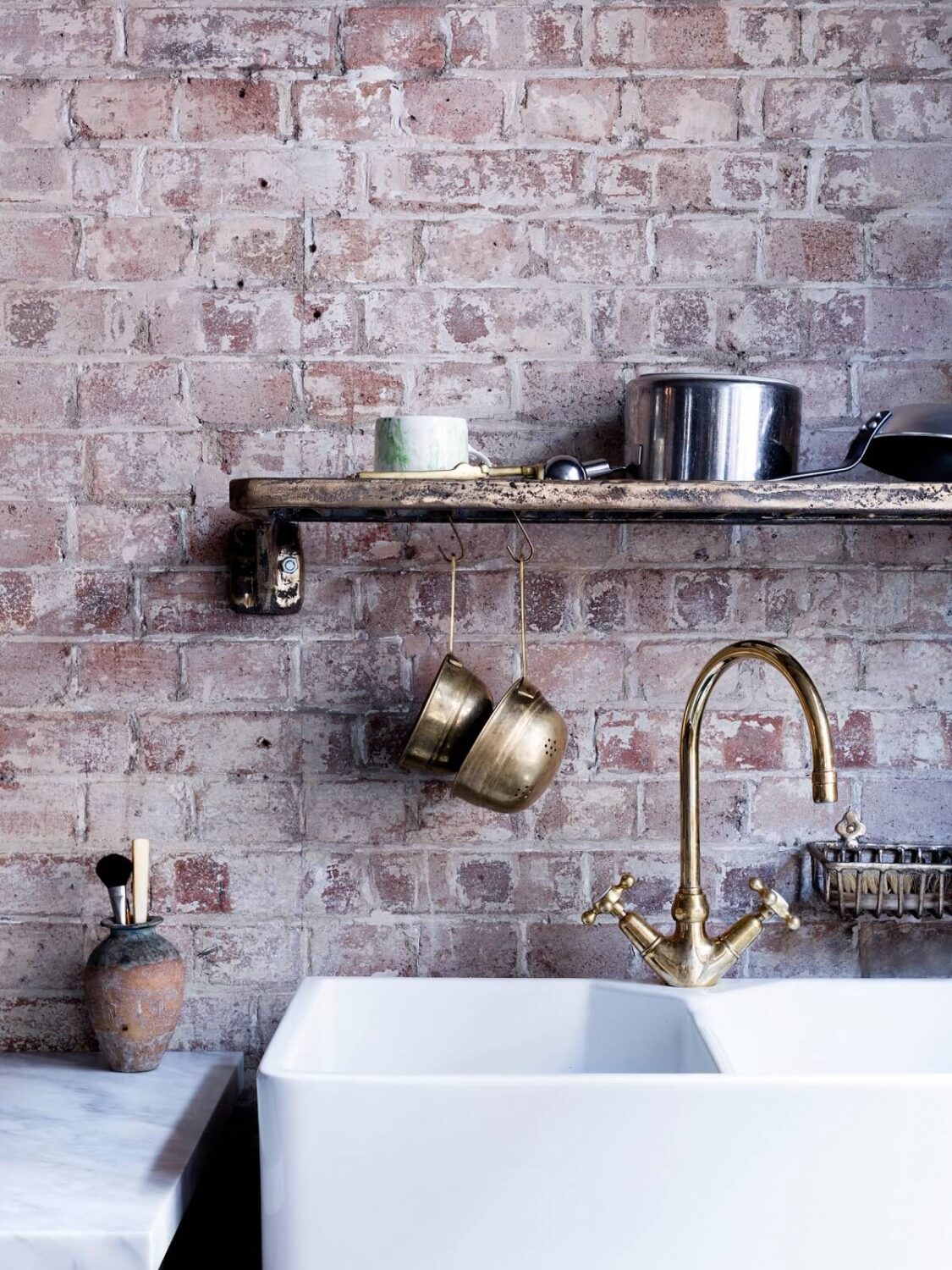 An Industrial Apartment by Mark Lewis Interior Design 5 cast-bronze-draining-rack-kitchen-brick-walls-nordroom