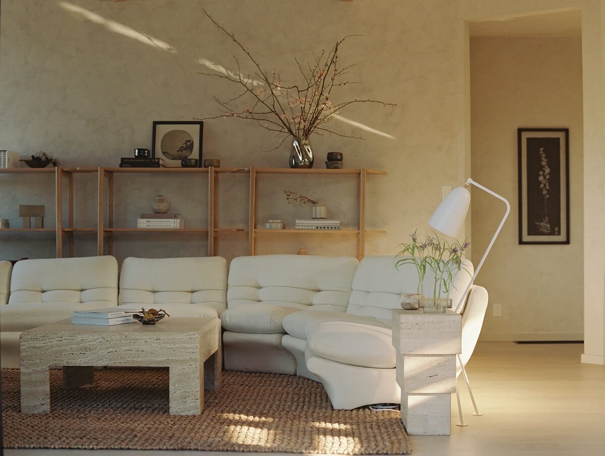 Japandi Design in a Midcentury Home in Los Angeles 9 curved-sofa-midcentury-bungalow-japandi-style-nordroom