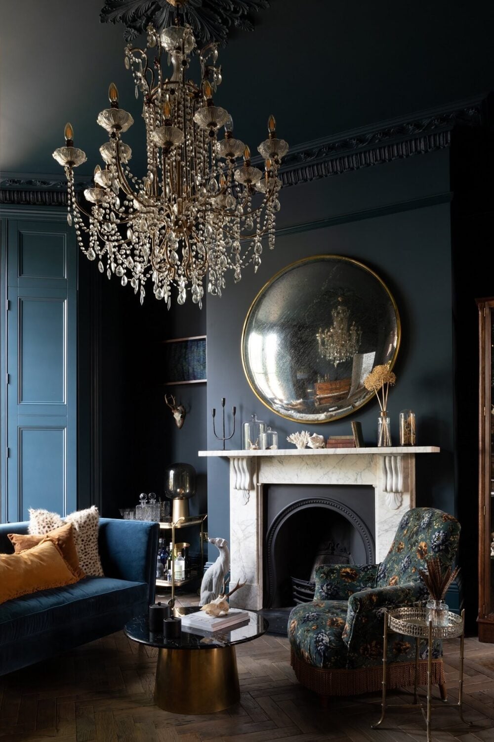 Contrasting Styles in a Victorian Home in London 6 dark-blue-victorian-sitting-room-fireplace-dark-blue-sofa-frank-and-faber-nordroom