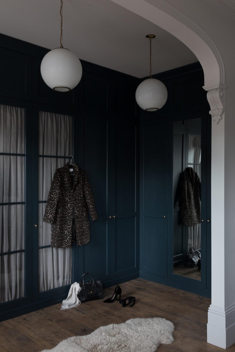 Contrasting Styles in a Victorian Home in London 22 dark-blue-walk-in-closet-victorian-home-london-frank-and-faber-nordroom
