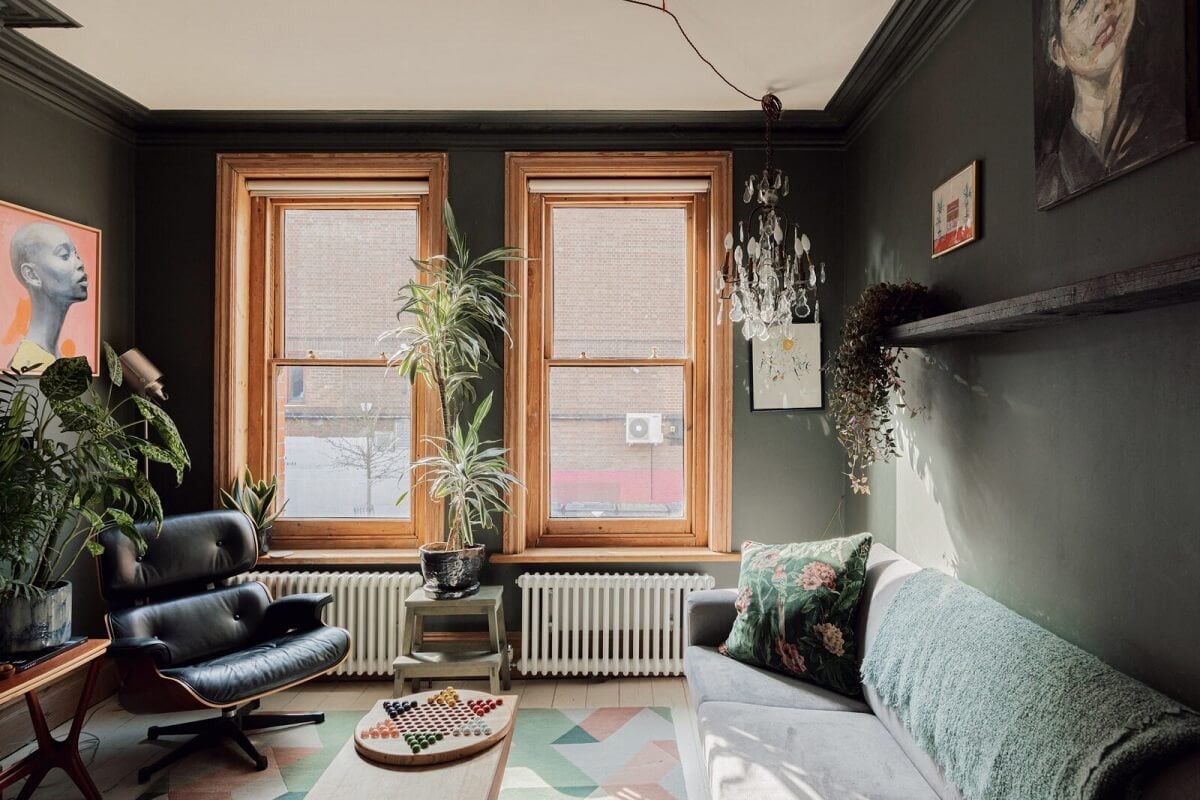 Colorful Rooms in an Edwardian Apartment in London 4 dark-green-living-room-stripped-wooden-window-frames-nordroom