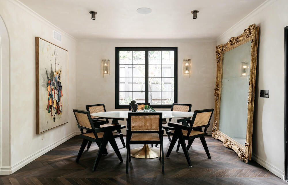 A Beautiful Tudor House in Los Feliz 17 dining-room-large-mirror-wooden-floor-nordroom