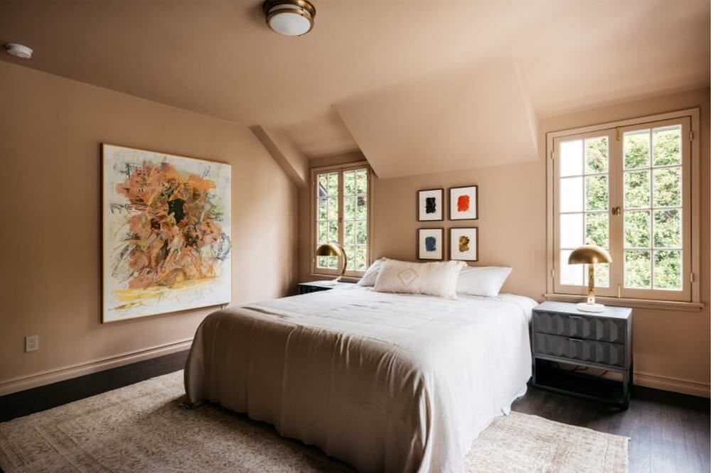 A Beautiful Tudor House in Los Feliz 33 dusty-pink-bedroom-slanted-ceiling-nordroom