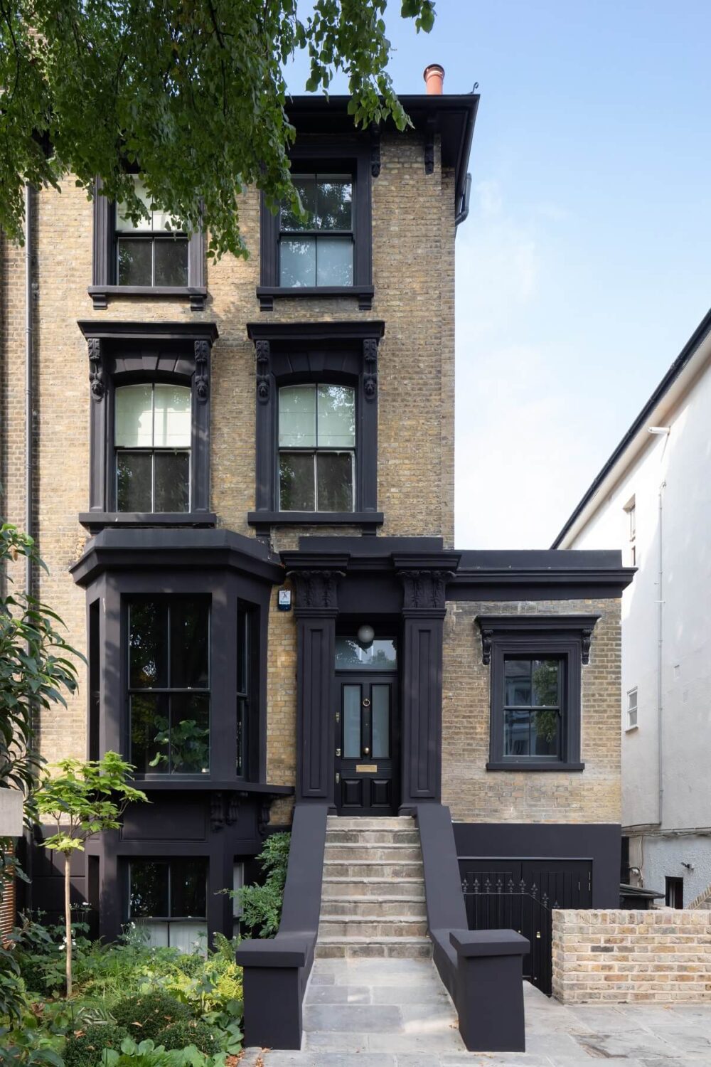 Boost Your Home's Value by Thousands with This Simple Paint Trick! 23 exterior-victorian-home-london-black-details-nordroom