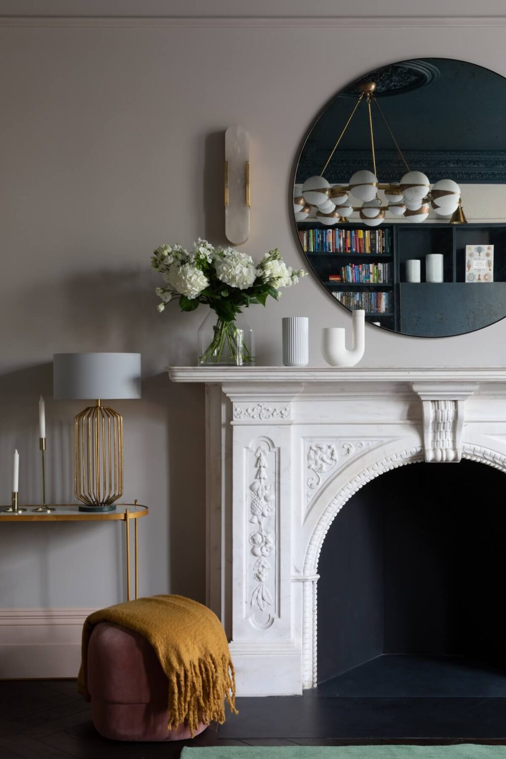 A Victorian Home in London with Bold Color Accents 4 fireplace-detail-round-mirror-victorian-home-london-modern-furnishings-frank-and-faber-nordroom
