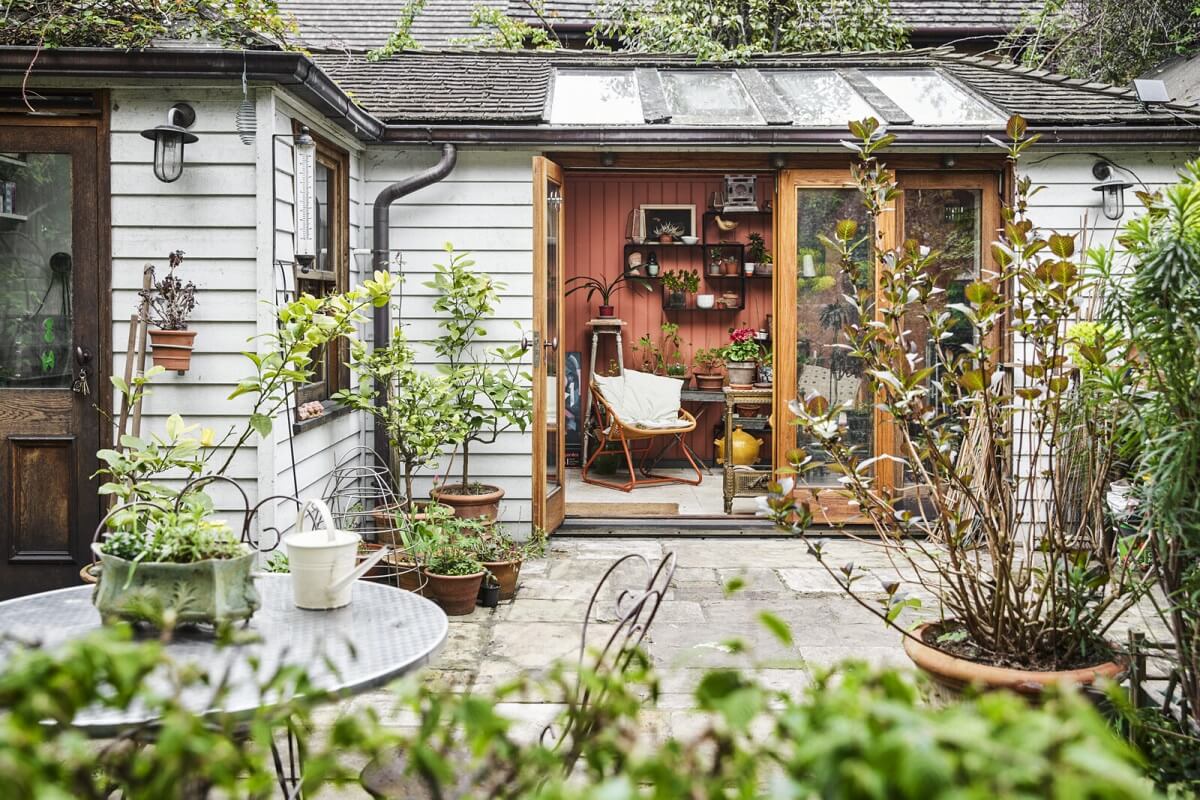 An Eclectic Art-Filled Townhouse in London 24 garden-conservatory-eclectic-london-home-nordroom