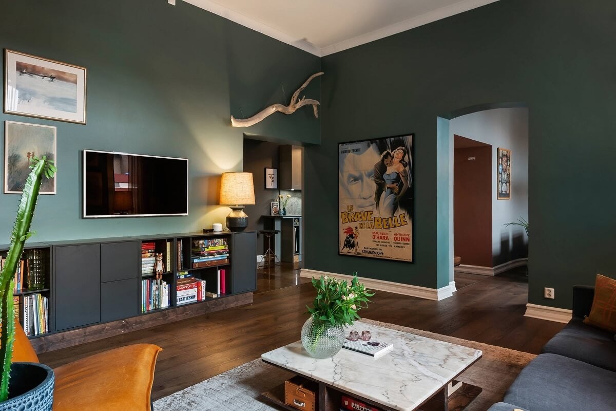 A Moody Family Home in Sweden 5 green-living-room-gray-wall-mounted-cabinets-nordroom