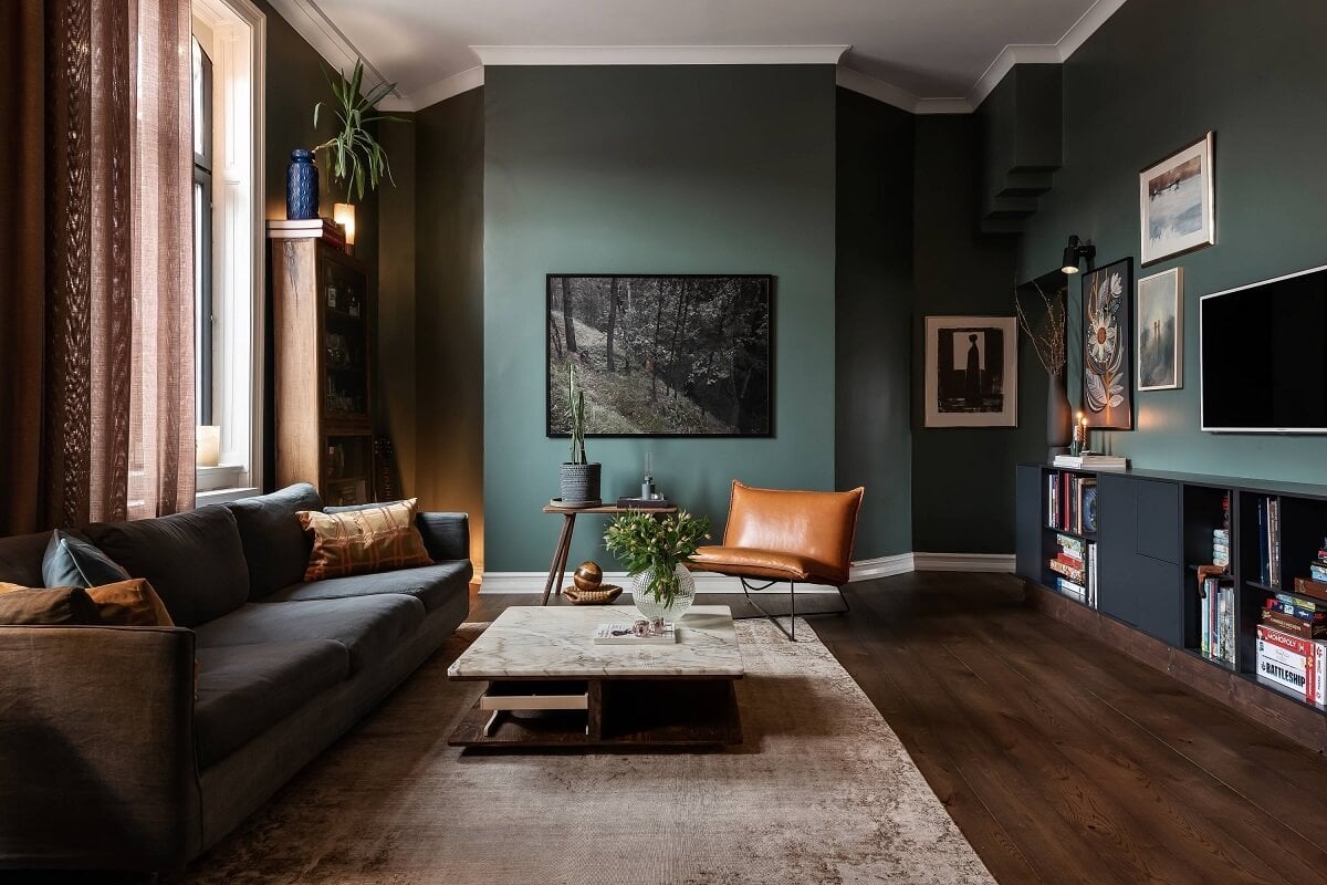 A Moody Family Home in Sweden 3 green-living-room-wooden-floor-moody-home-nordroom