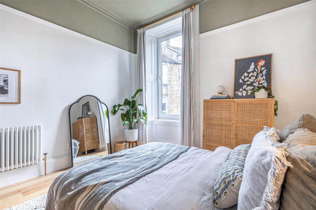 Kate Spiers Sells Her Beautiful Light Flat in Glasgow 21 green-painted-ceiling-bedroom-mirror-wooden-floor-nordroom