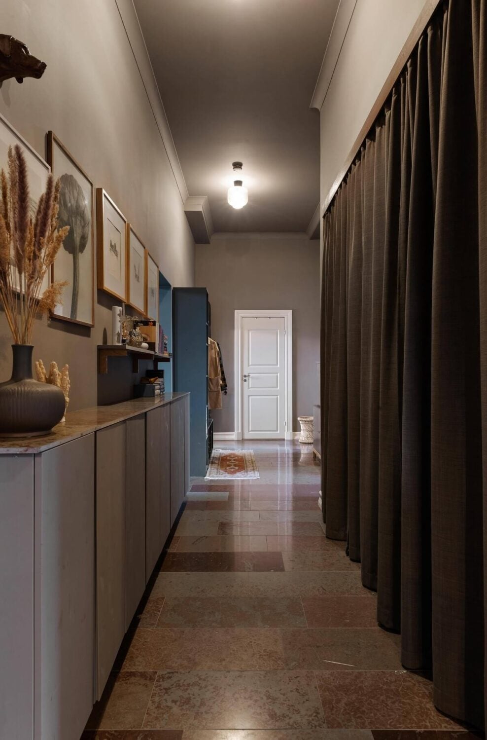 A Moody Family Home in Sweden 23 hallway-gray-cabinets-moody-home-nordroom