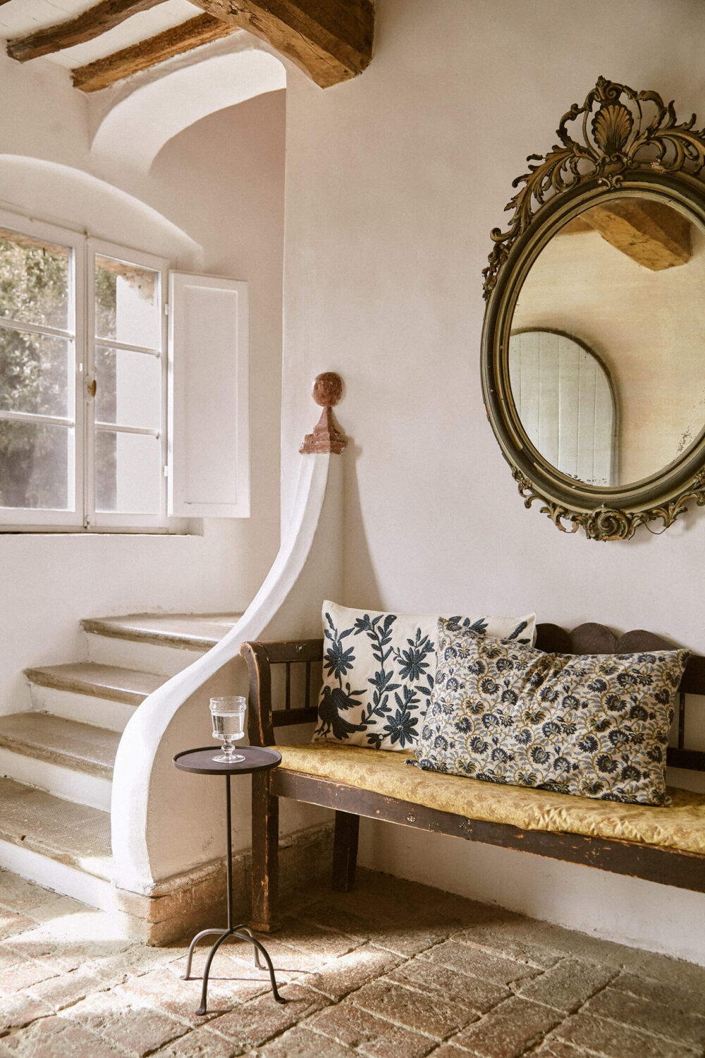 A Tuscan Villa by Zara Home 12 hallway-stone-floor-antique-round-mirror-tuscan-villa-zara-home-nordroom