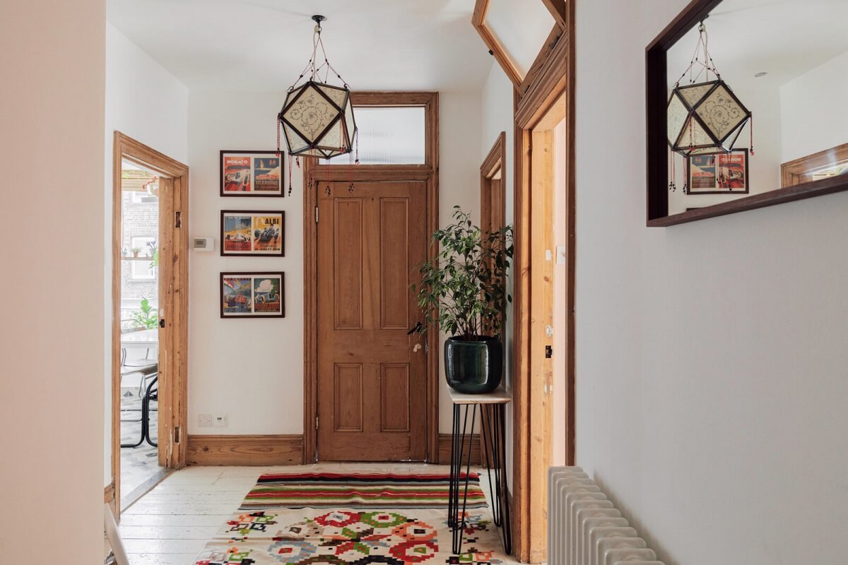 Colorful Rooms in an Edwardian Apartment in London 16 hallway-stripped-four-panel-doors-edwardian-flat-nordroom
