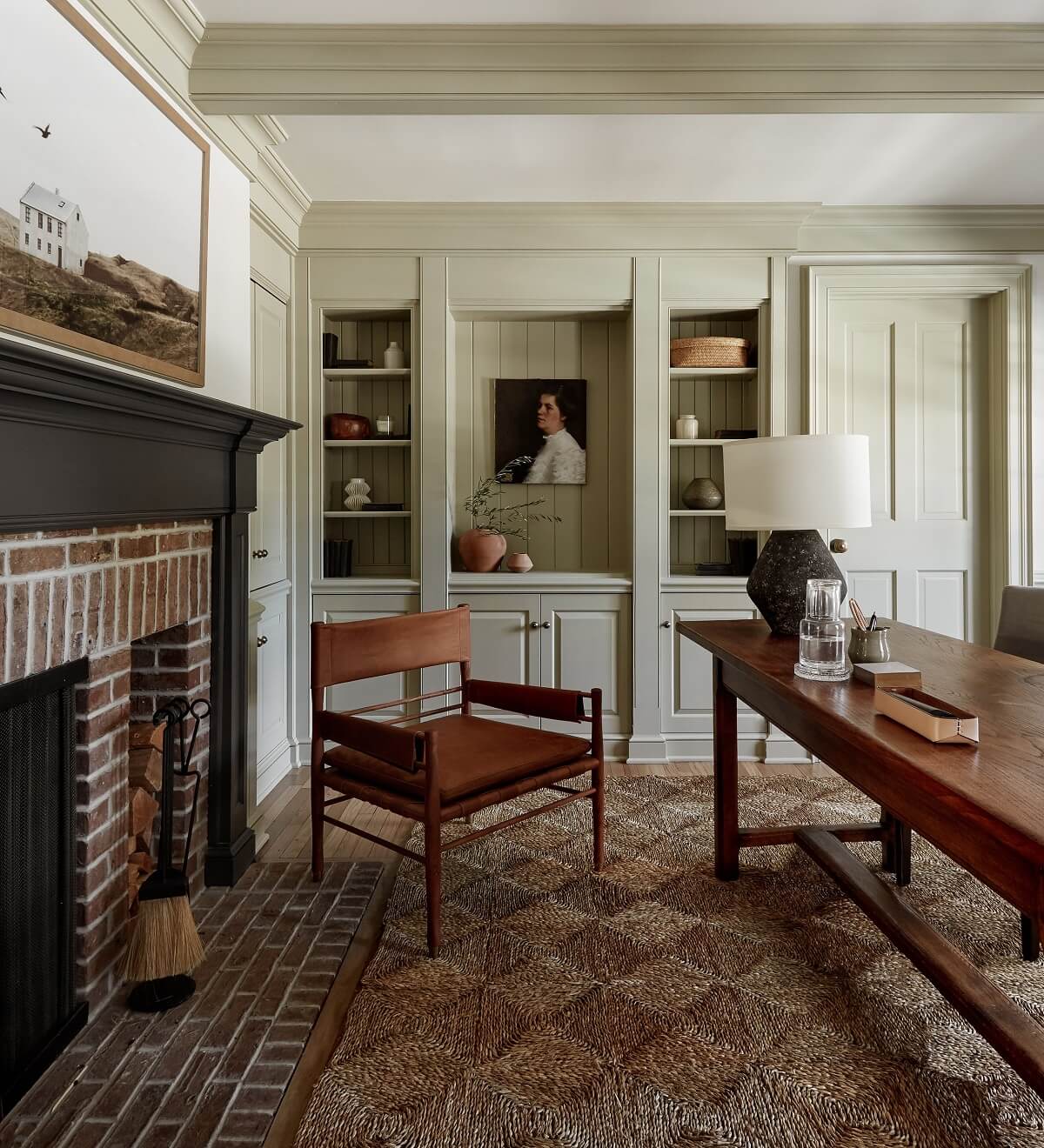A Warm Family Home in Connecticut 7 home-office-large-wooden-table-brick-fireplace-built-in-bookshelves-nordroom