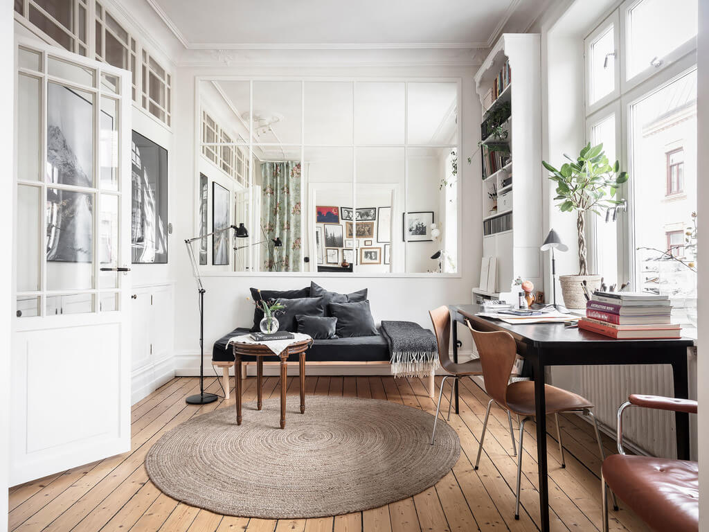 A Bright Nordic Home with Small (but Smartly Designed) Bedrooms 18 home-office-wooden-floor-daybed-nordroom