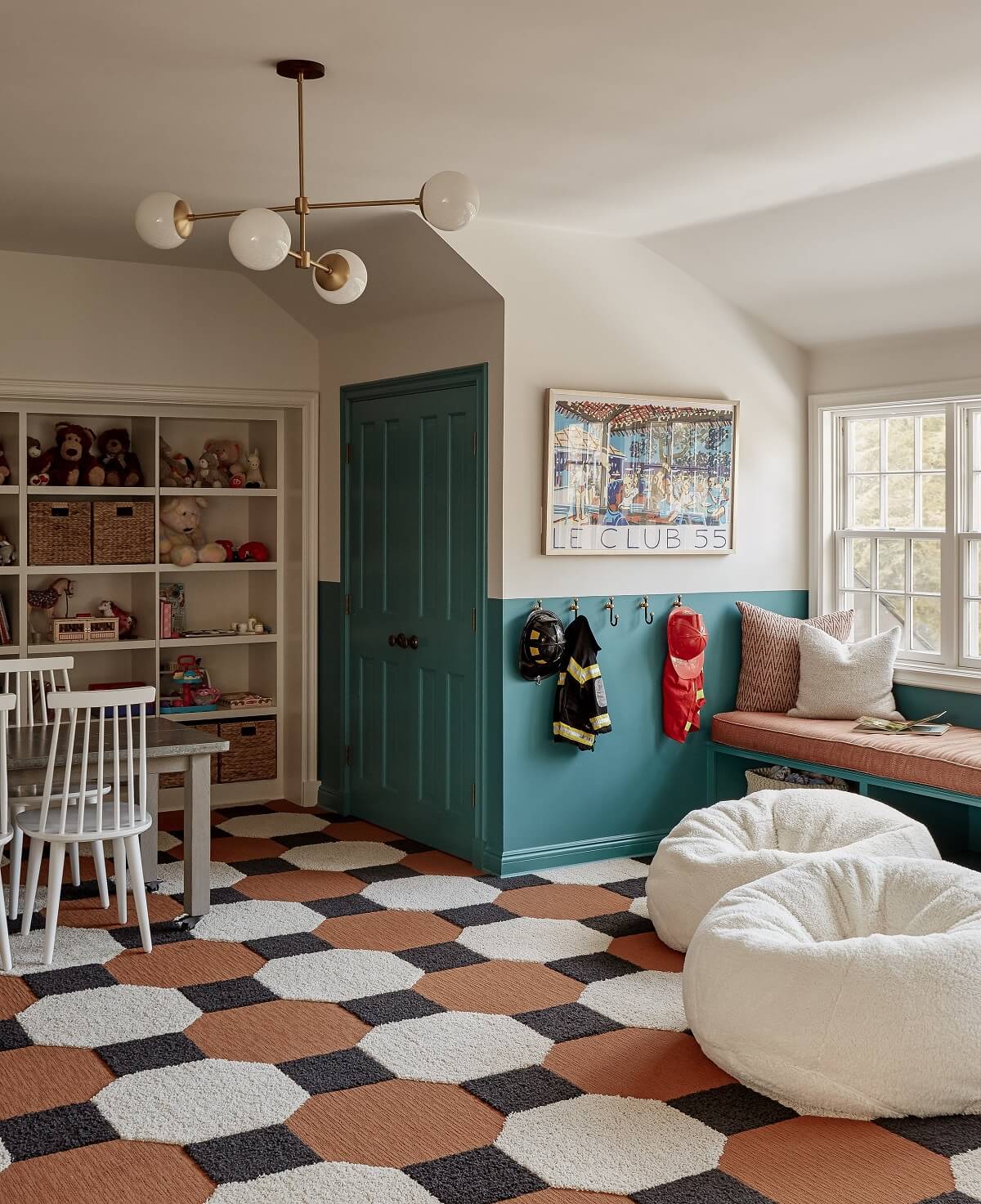 A Warm Family Home in Connecticut 15 kids-play-room-crafts-room-green-wood-panels-door-carpet-nordroom