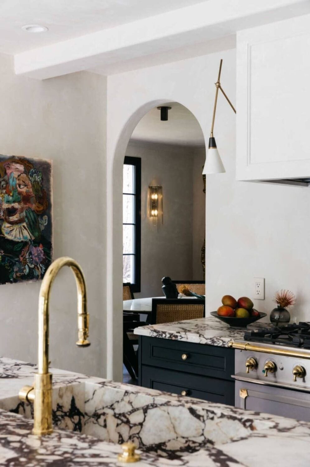 A Beautiful Tudor House in Los Feliz 8 kitchen-detail-marble-worktop-dark-blue-cabinets-nordroom