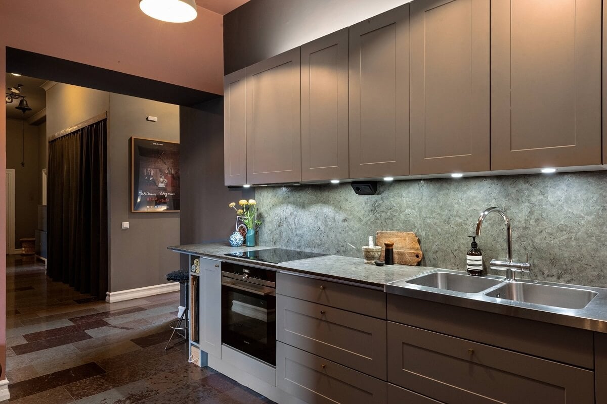A Moody Family Home in Sweden 10 kitchen-gray-cabinets-moody-apartment-nordroom