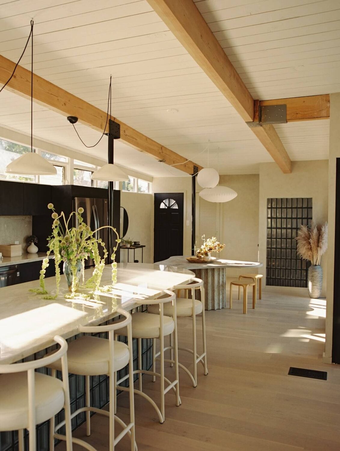 Japandi Design in a Midcentury Home in Los Angeles 2 kitchen-island-round-bar-stools-nordorom