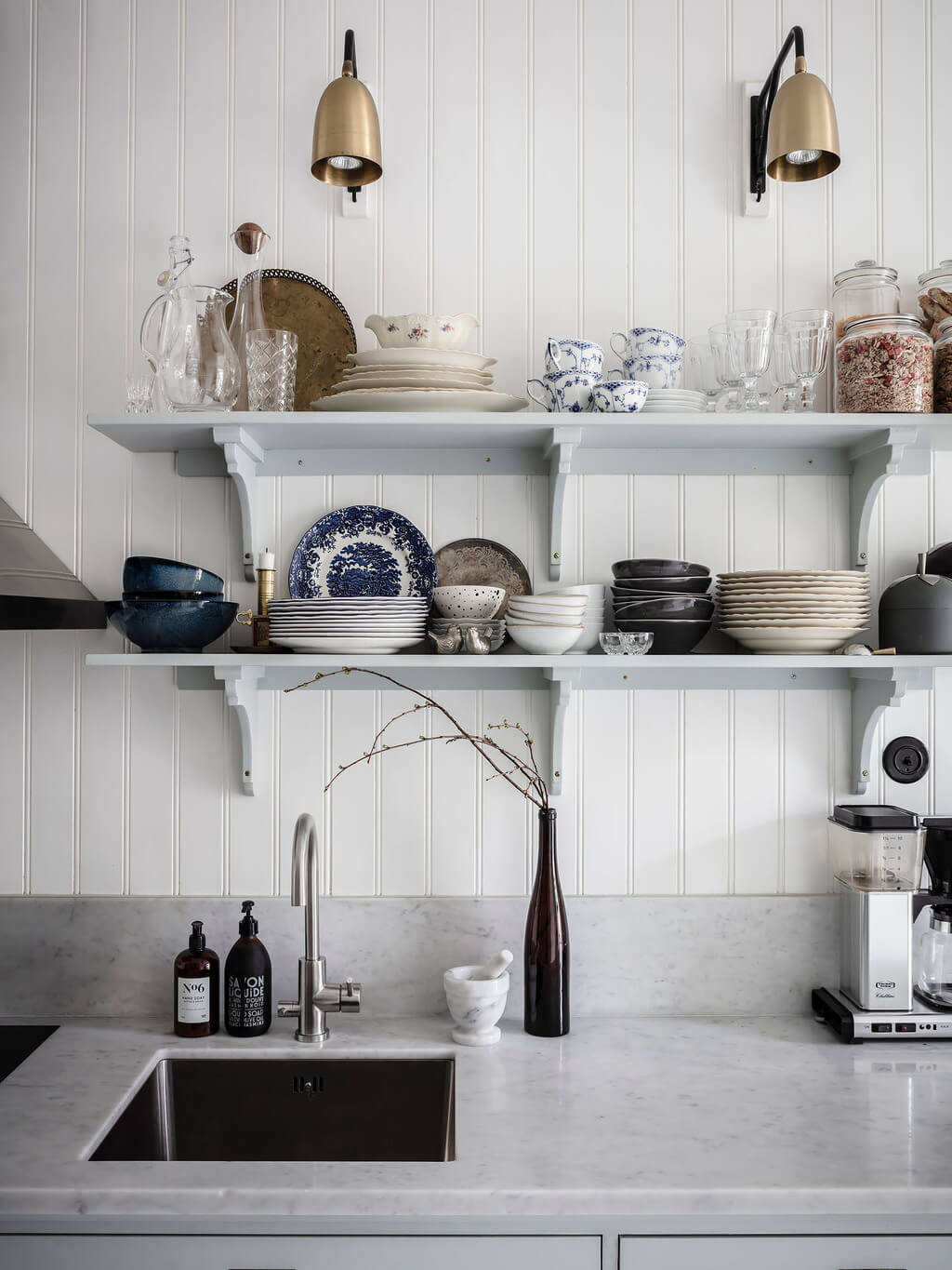 A Bright Nordic Home with Small (but Smartly Designed) Bedrooms 5 kitchen-open-shelves-light-gray-cabinets-nordroom