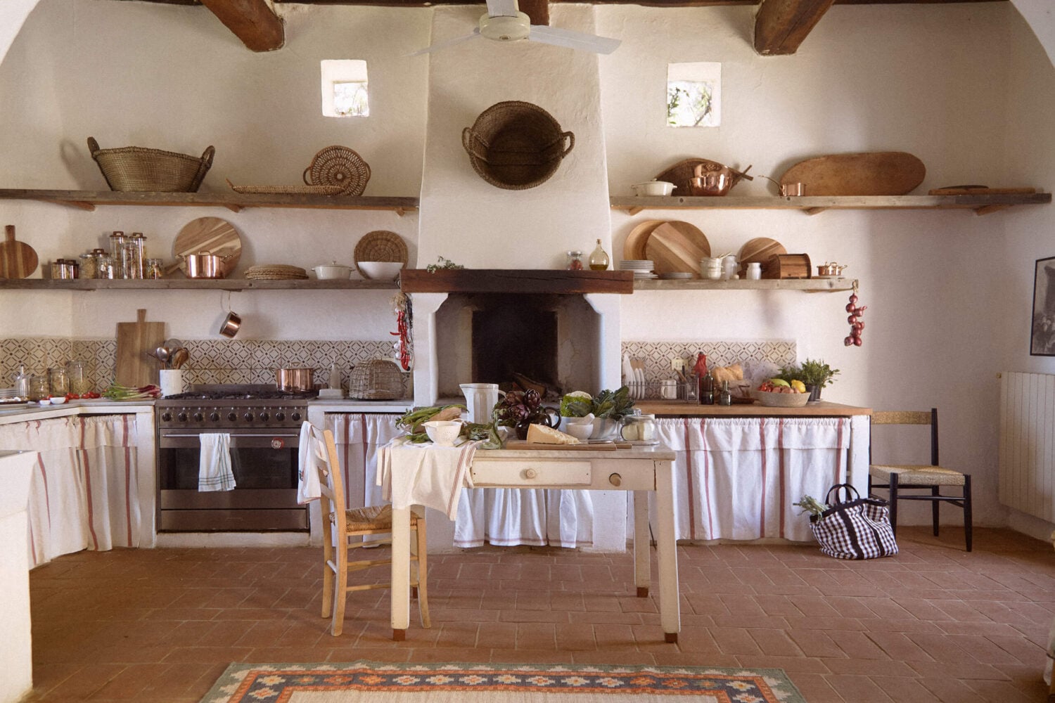 A Tuscan Villa by Zara Home 2 kitchen-skirting-mediterranean-style-open-shelves-terracotta-floor-villa-tuscany-zara-home-nordroom