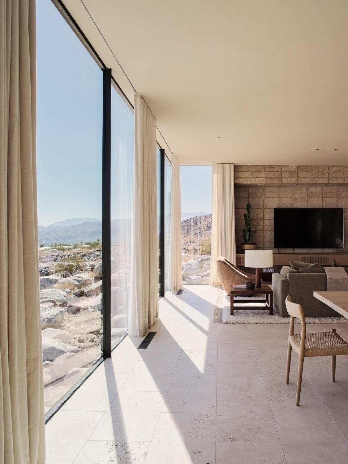 A Modern Architectural Home in Palm Springs 3 living-room-floor-to-ceiling-windows-palm-springs-woodsdangaran-nordroom