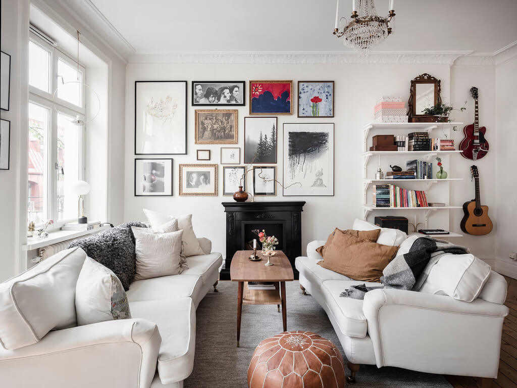 A Bright Nordic Home with Small (but Smartly Designed) Bedrooms 13 living-room-gallery-wall-black-fireplace-nordroom