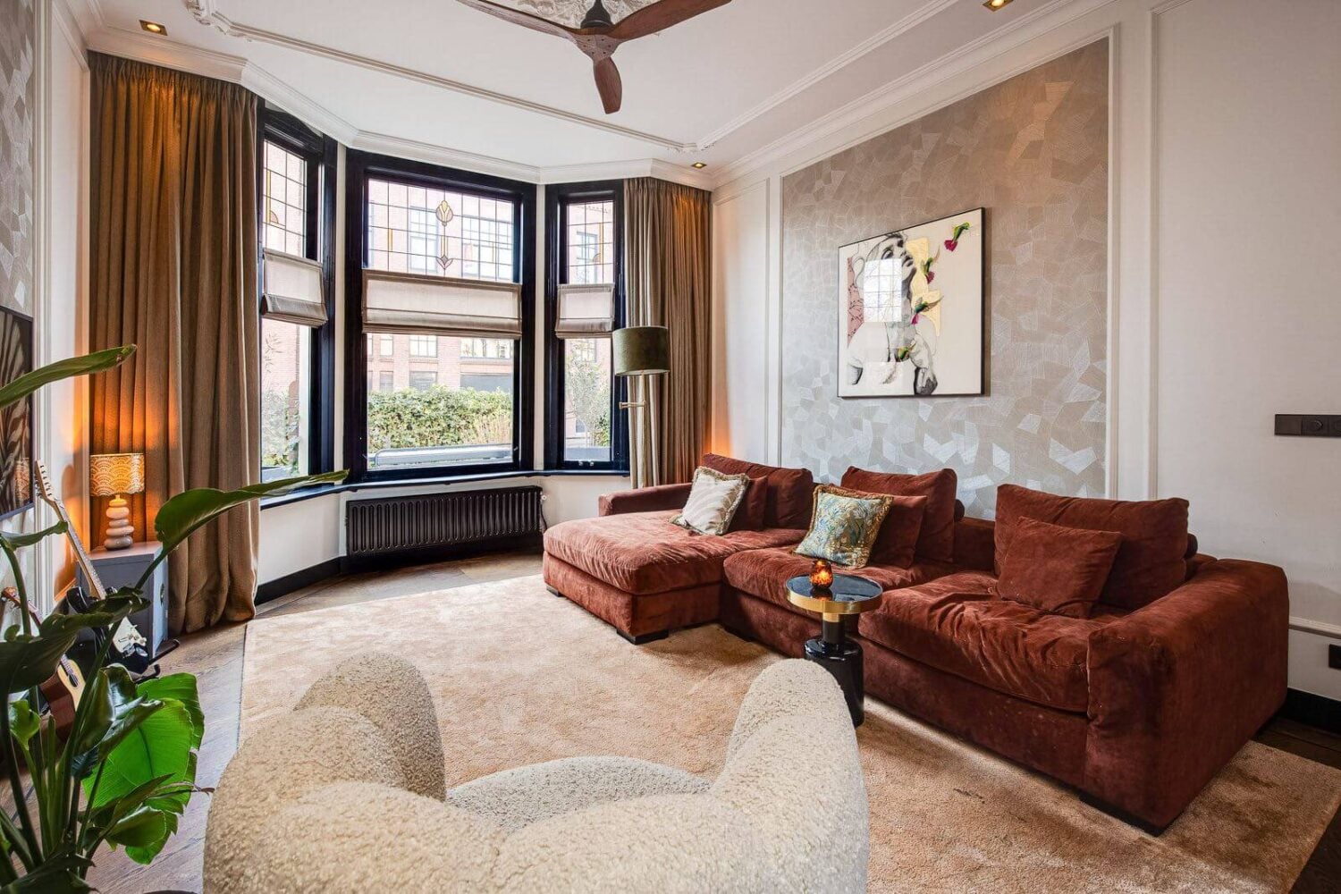 A Dutch Family Home with Warm Color Accents 7 living-room-rust-red-sofa-warm-family-home-nordroom
