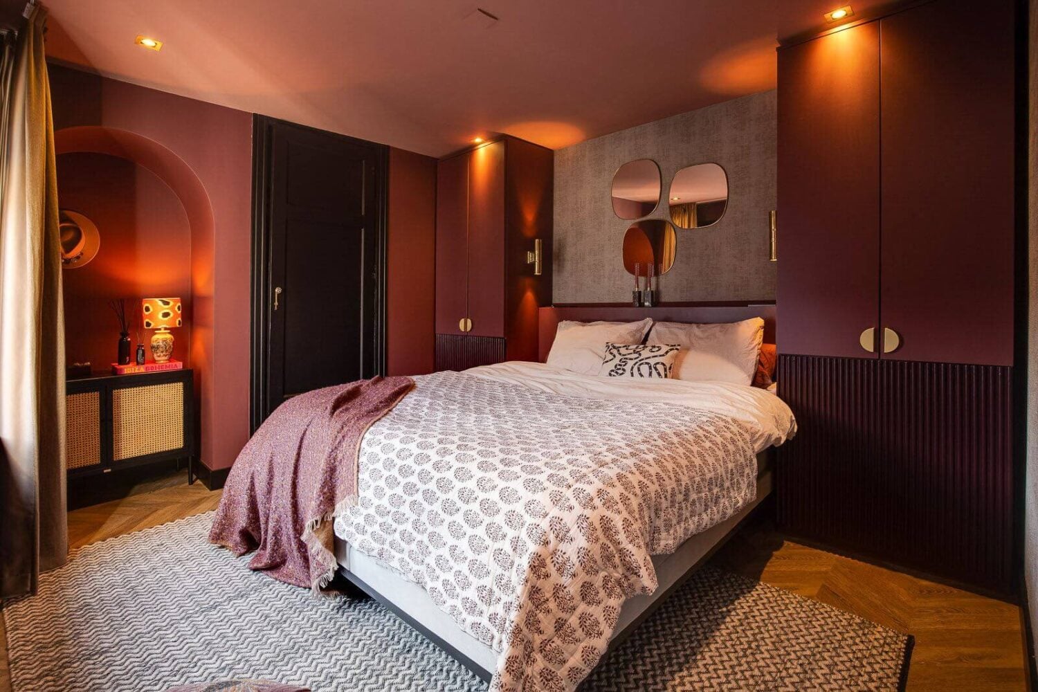 A Dutch Family Home with Warm Color Accents 13 master-bedroom-warm-pink-walls-built-in-wardrobes-nordroom