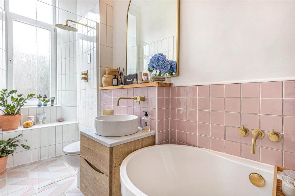 Kate Spiers Sells Her Beautiful Light Flat in Glasgow 18 narrow-bathroom-freestanding-bath-shower-arched-mirror-pink-tiles-nordroom
