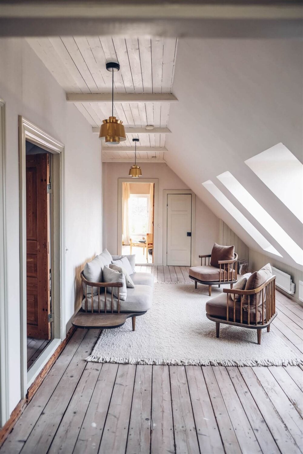 Our Food Stories' Countryside Cottage in Sweden 20 natural-sitting-room-slanted-ceiling-nordroom