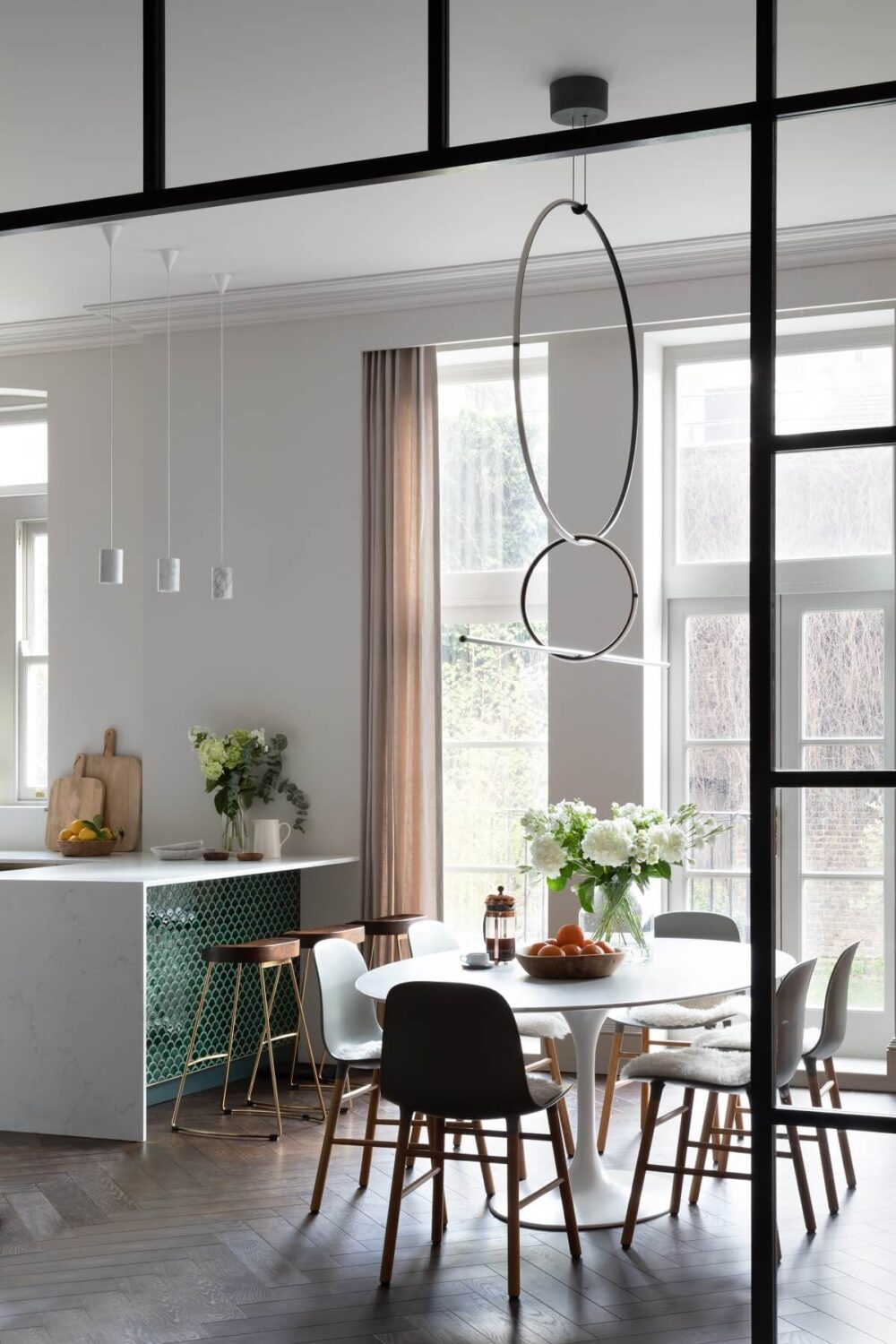 A Victorian Home in London with Bold Color Accents 10 open-plan-kitchen-dining-room-crittal-doors-green-tiles-wooden-floor-victorian-home-london-frank-and-faber-nordroom