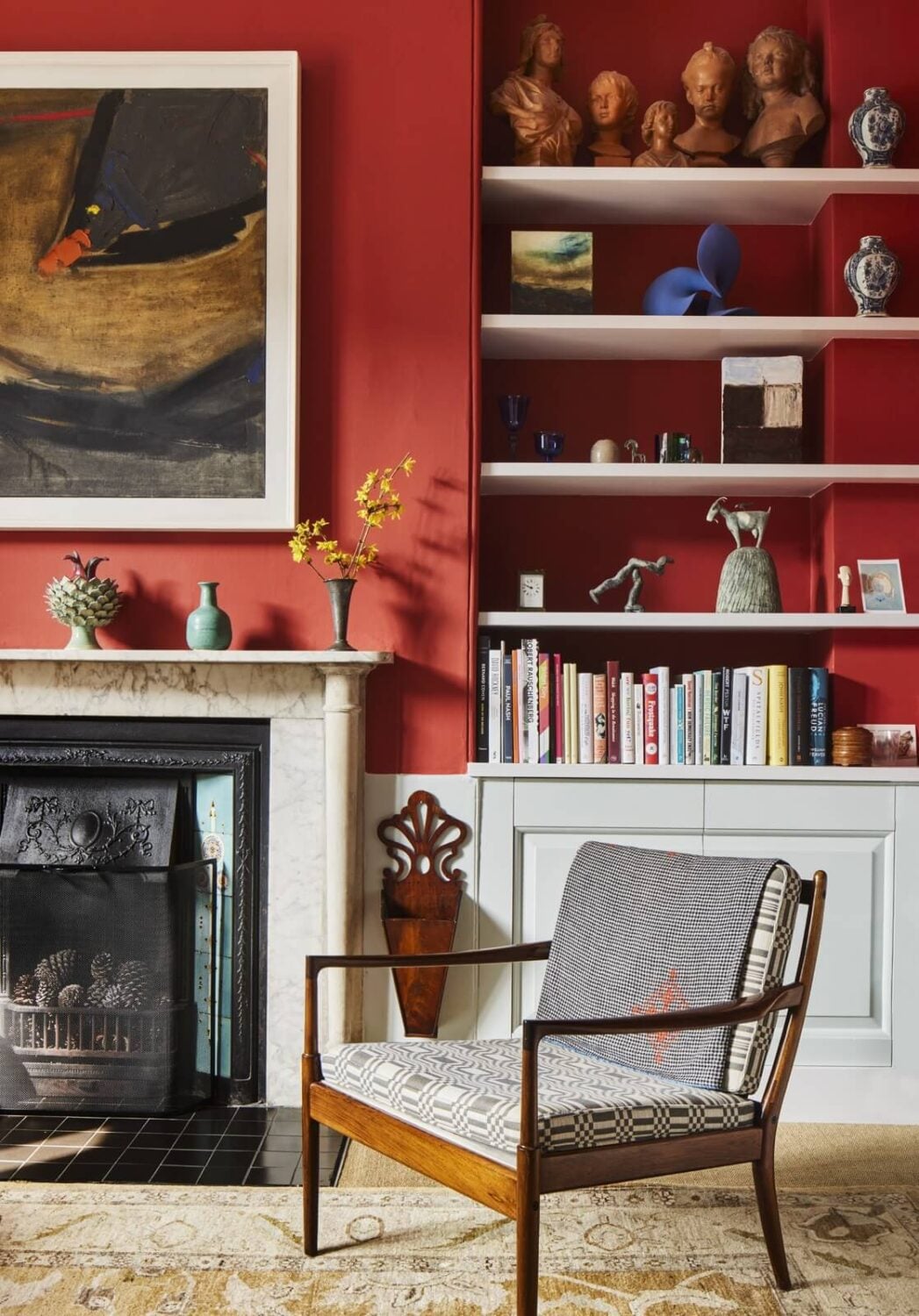 50+ Rooms That Prove ‘The Unexpected Red Theory’ Really Works 49 red-sitting-room-fireplace-shelves-nordroom