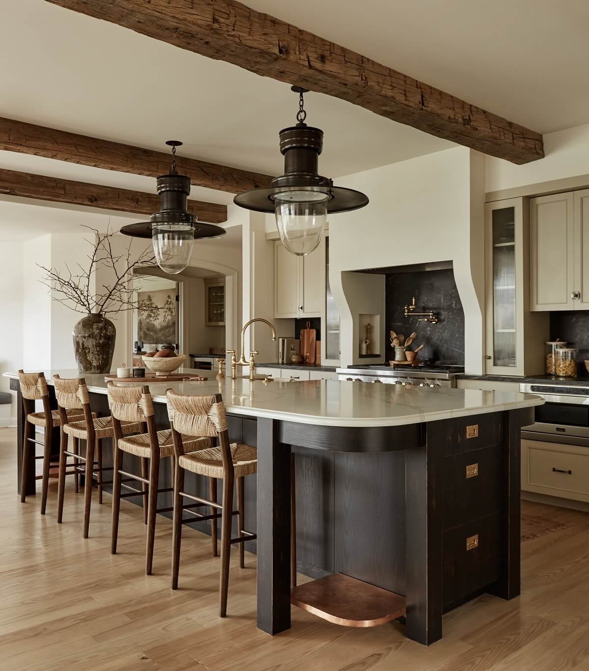 A Warm Family Home in Connecticut 2 rounded-kitchen-island-exposed-beams-nordroom