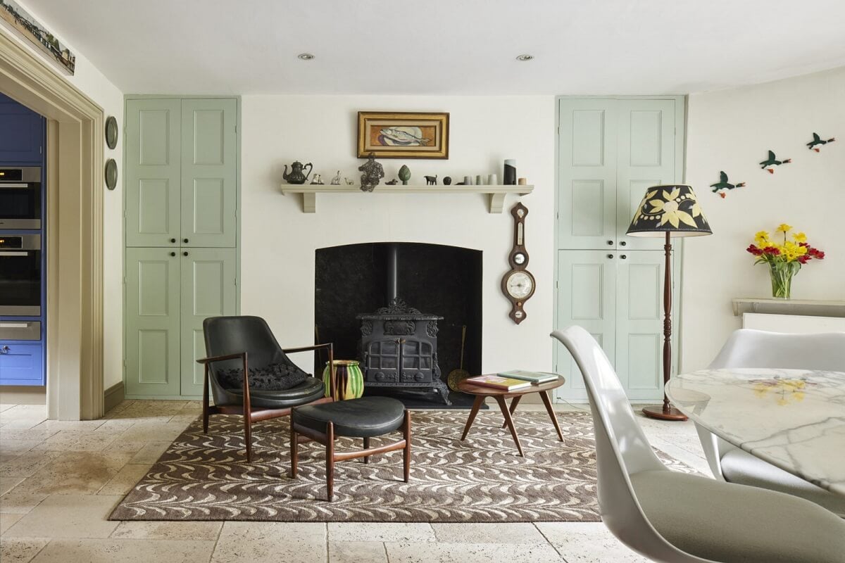 An Eclectic Art-Filled Townhouse in London 7 serene-sitting-room-stone-floor-fireplace-nordroom