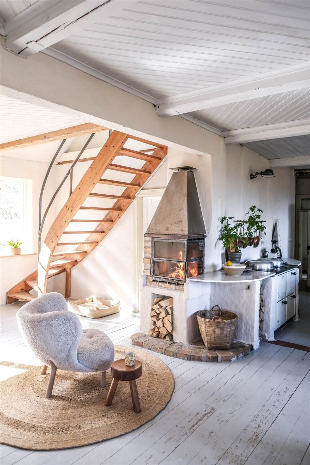Our Food Stories' Countryside Cottage in Sweden 9 sitting-area-fireplace-country-home-nordroom