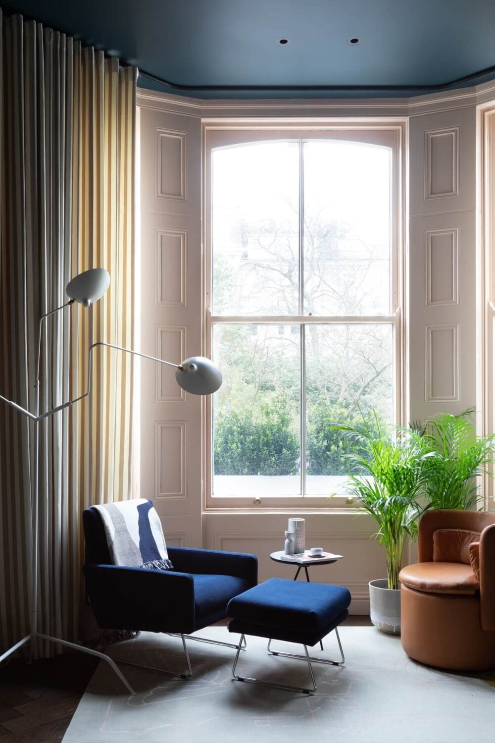 A Victorian Home in London with Bold Color Accents 7 sitting-room-bay-window-painted-ceiling-blue-armchair-frank-and-faber-nordroom