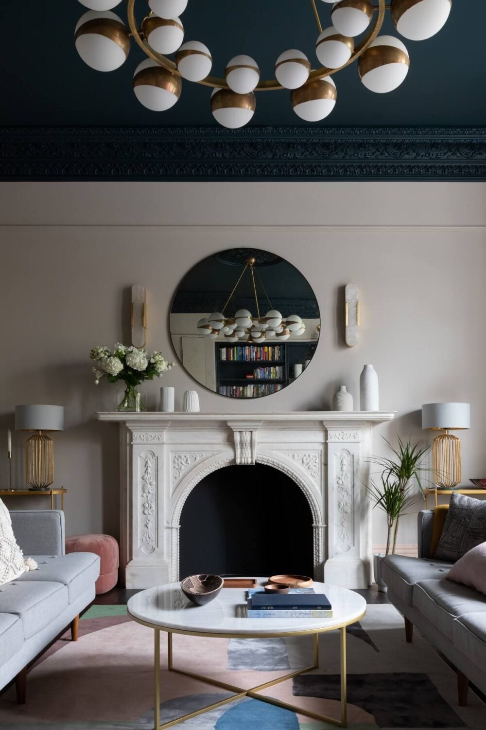 A Victorian Home in London with Bold Color Accents 3 sitting-room-victorian-home-modern-furnishings-dark-blue-ceiling-fireplace-pendant-nordroom