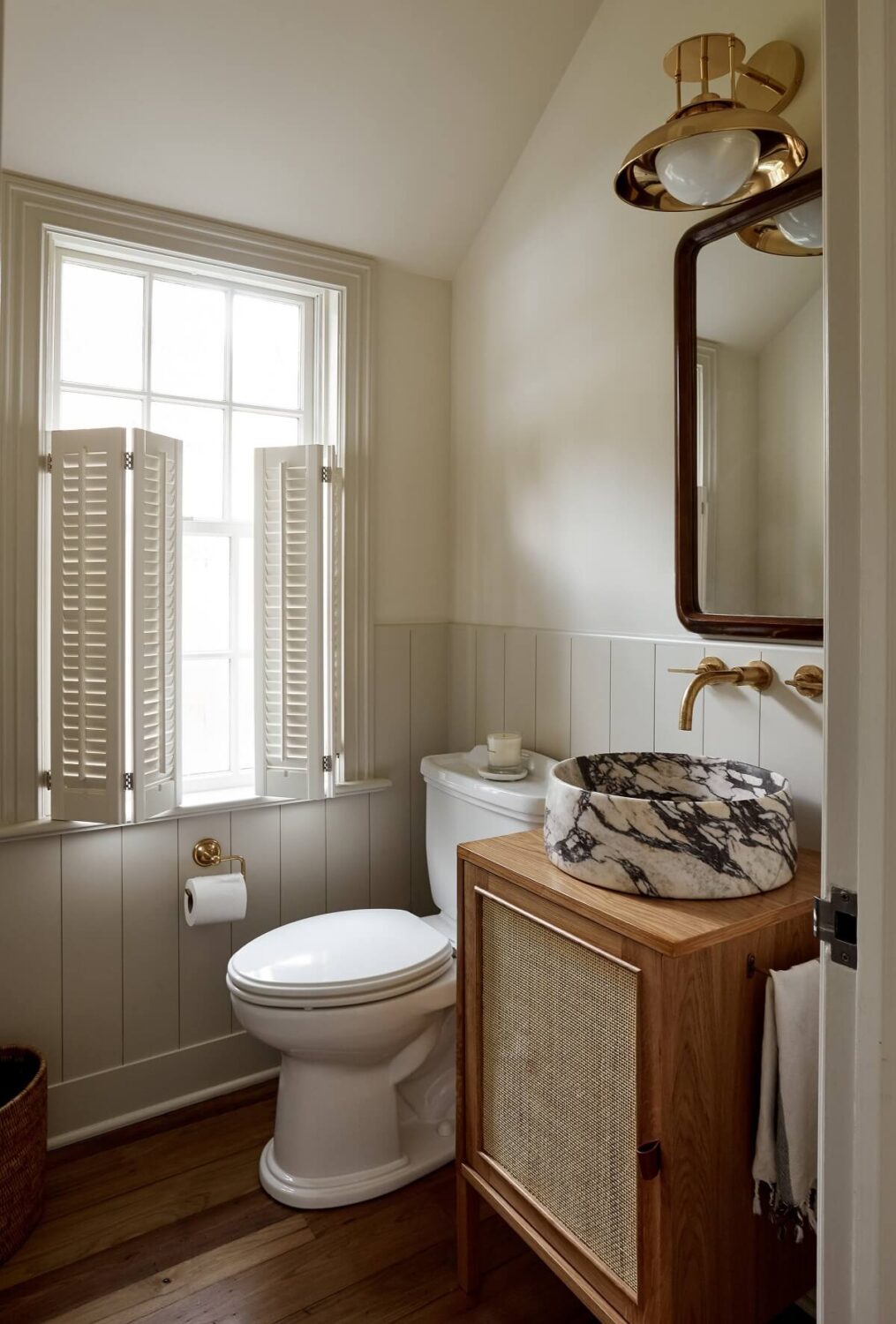 A Warm Family Home in Connecticut 14 small-bathroom-round-marble-sink-white-shutters-nordroom