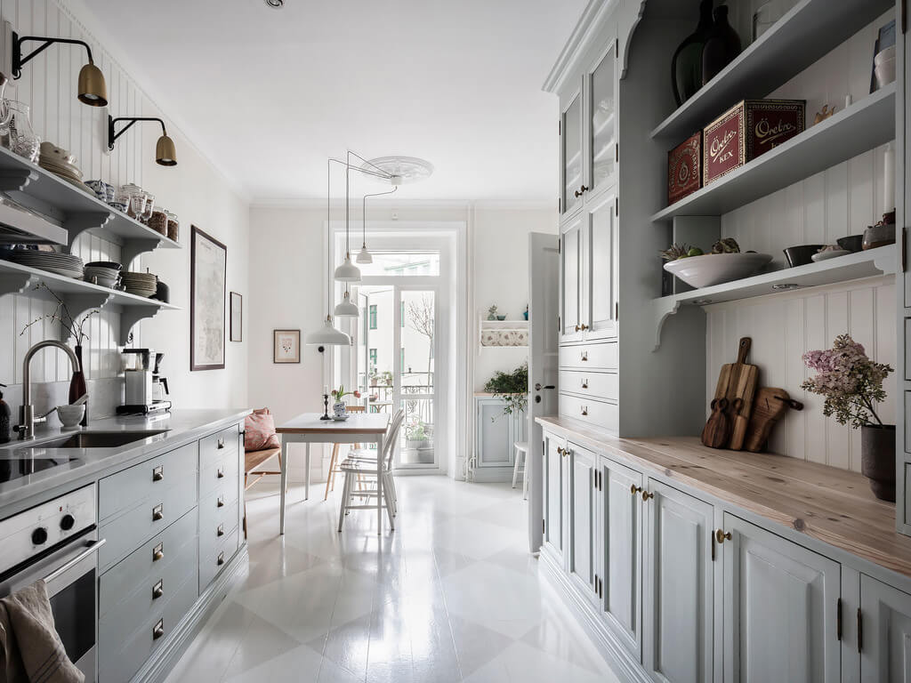 A Bright Nordic Home with Small (but Smartly Designed) Bedrooms 6 spacious-bright-galley-kitchen-scandinavian-nordroom