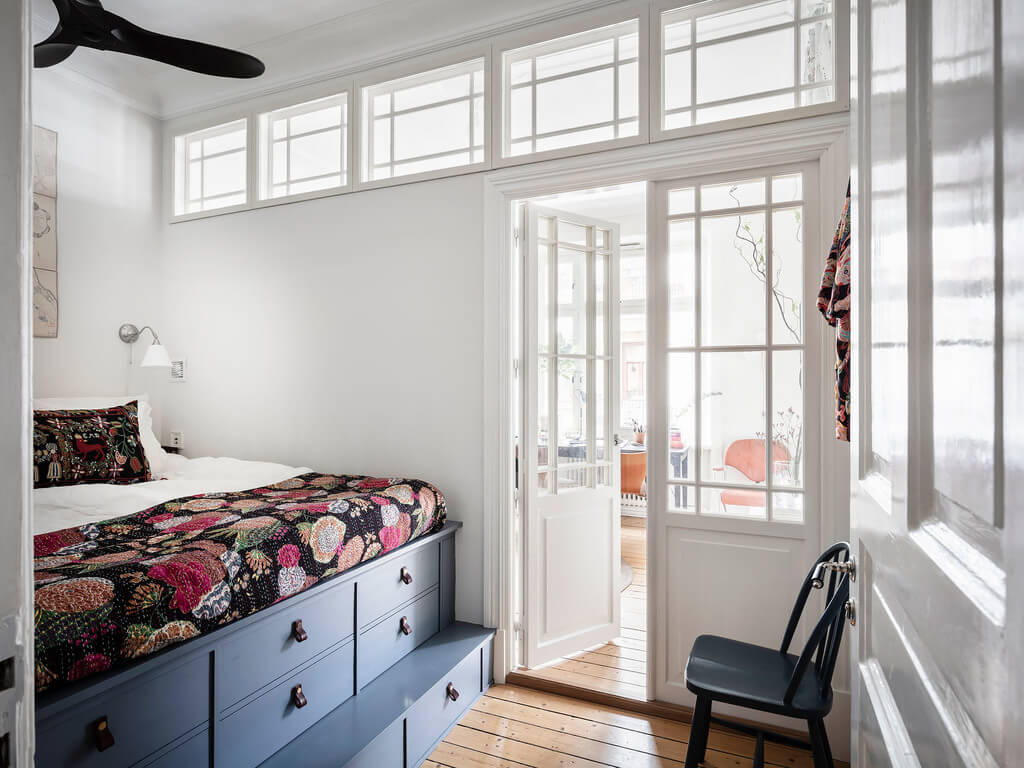 A Bright Nordic Home with Small (but Smartly Designed) Bedrooms 22 storage-bed-blue-drawers-narrow-bedroom-nordroom