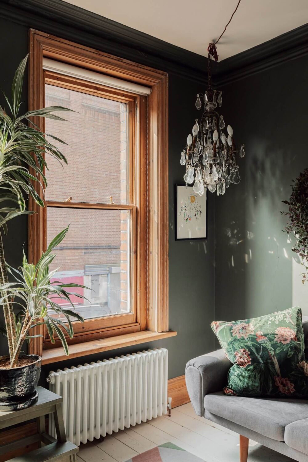 Colorful Rooms in an Edwardian Apartment in London 5 stripped-wooden-window-frames-dark-green-sitting-room-london-flat-nordroom