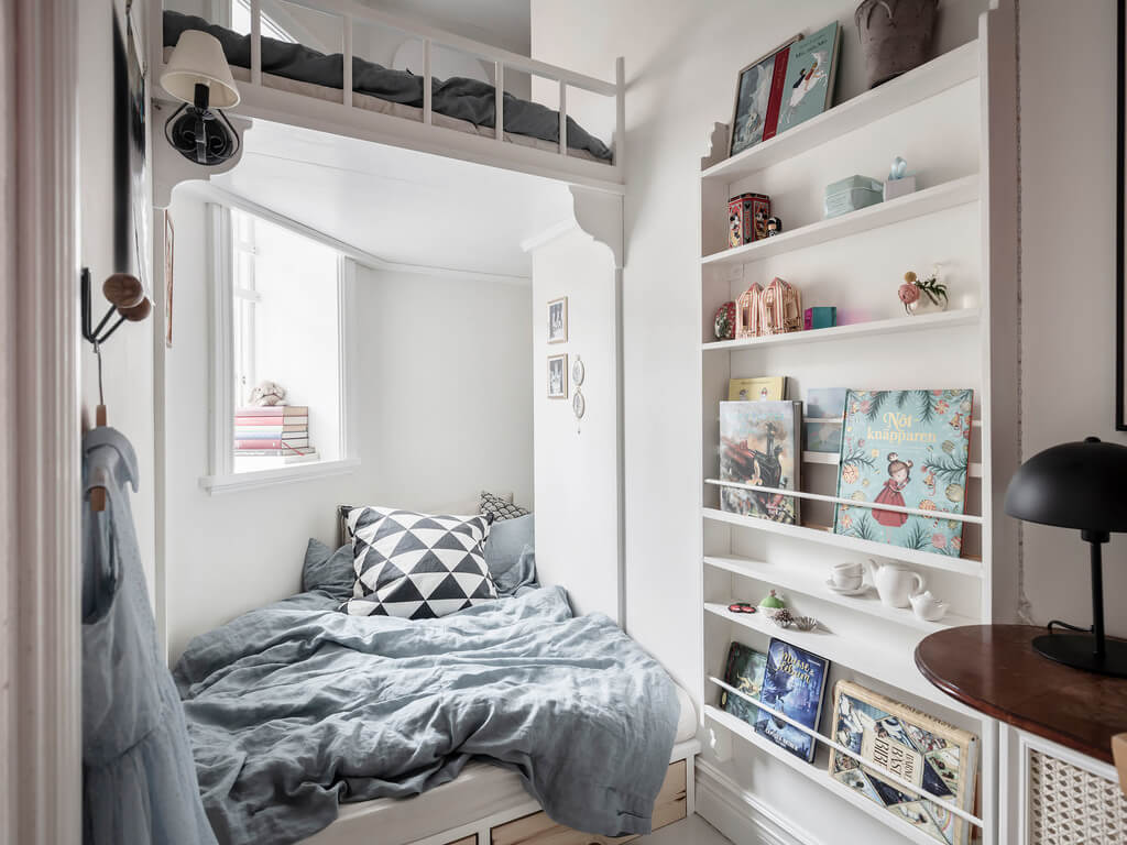 A Bright Nordic Home with Small (but Smartly Designed) Bedrooms 24 tiny-bedroom-loft-built-in-narrow-bookshelves-nordorom