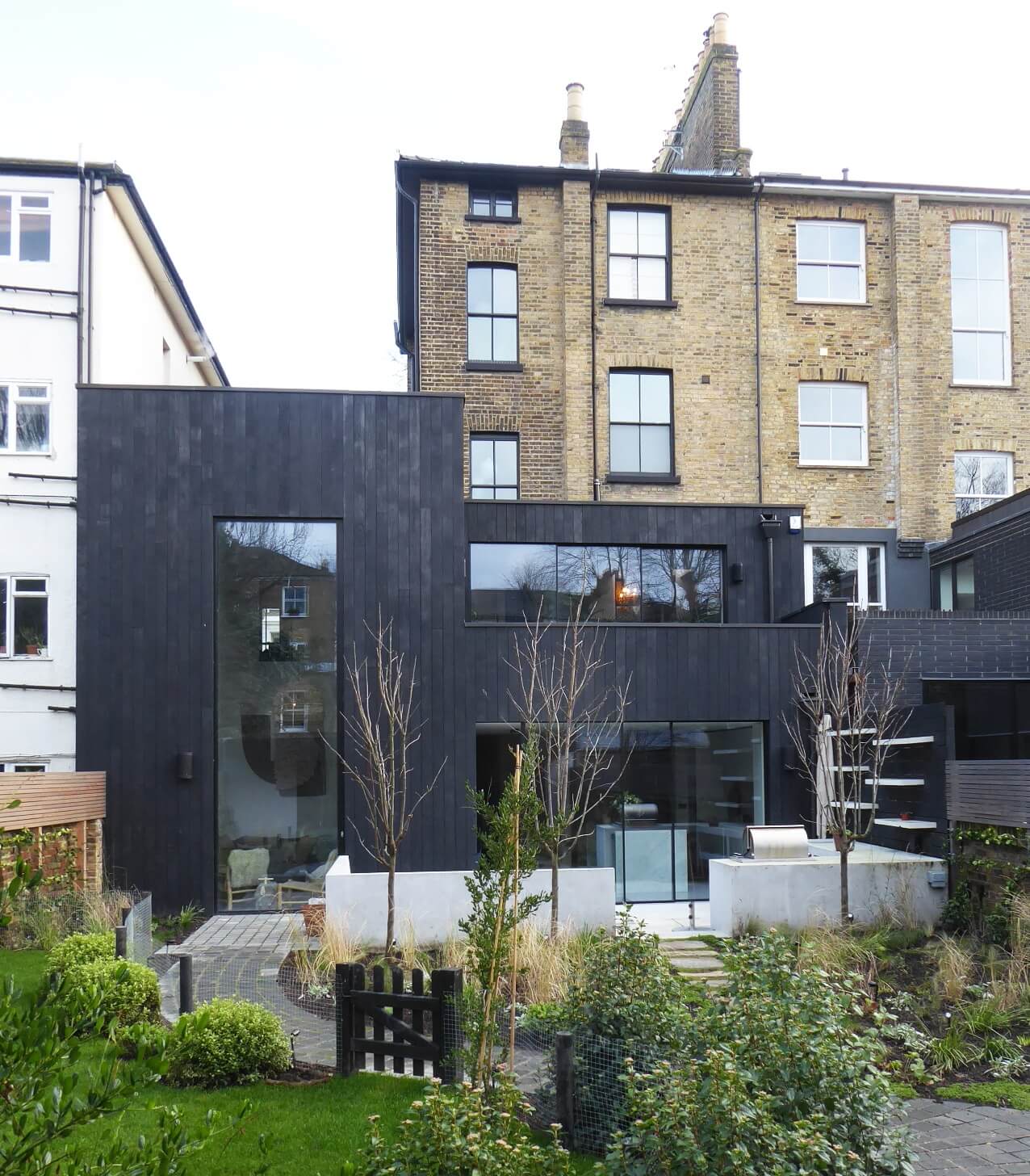 Contrasting Styles in a Victorian Home in London 28 victorian-townhouse-east-london-frank-and-faber-modern-black-wooden-extension-nordroom