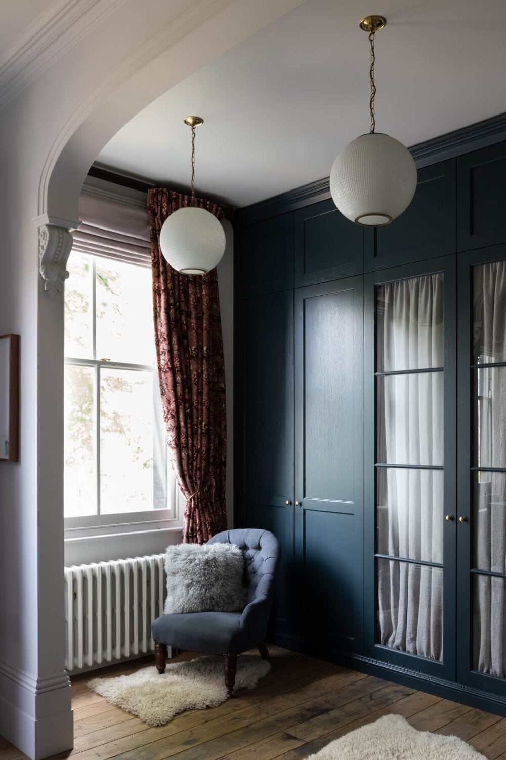 Contrasting Styles in a Victorian Home in London 23 walk-in-closet-blue-wardrobes-victorian-home-london-nordroom