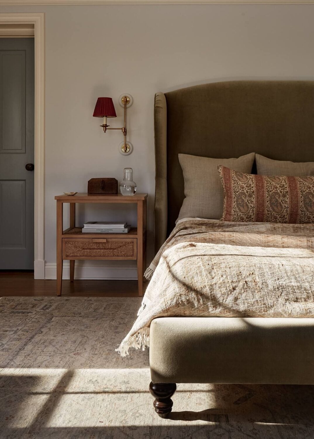 A Warm Family Home in Connecticut 9 warm-master-bedroom-velvet-bedframe-family-home-nordroom