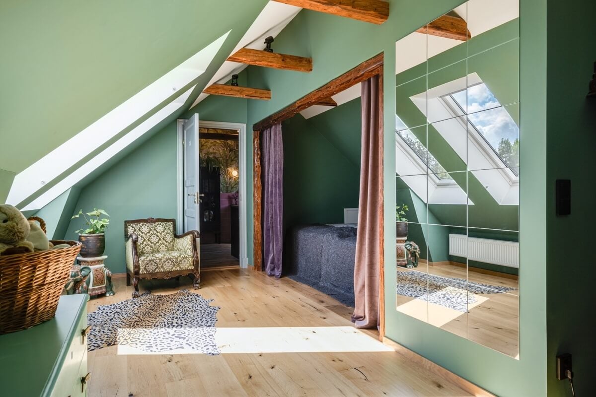 A Colorful Family Home in a Former School Building 27 attic-bedroom-bed-nook-green-walls-nordroom