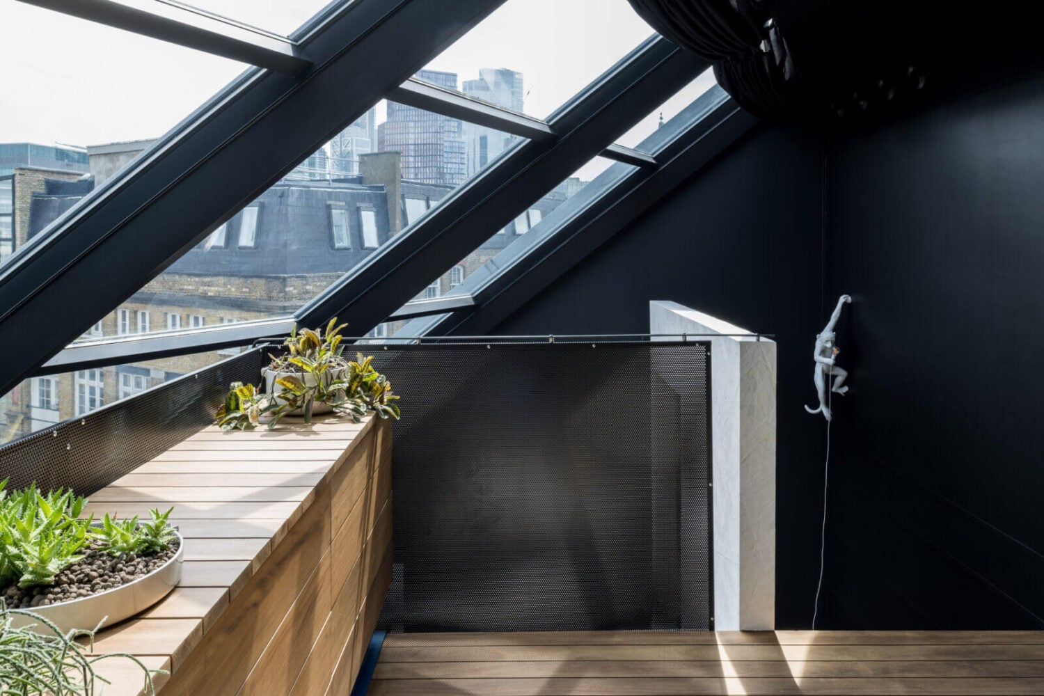 A Spectacular Modern Black Loft in London 14 attic-bedroom-skylights-modern-black-loft-nordroom